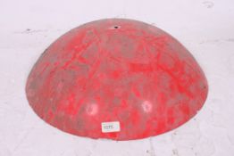 A large red enamel painted metal Industr