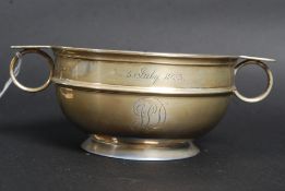 A stunning twin handled silver bowl havi