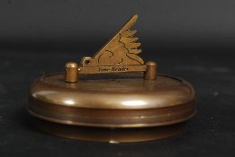 A brass cased compass and sundial
