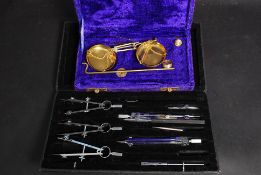 Two cased sets, one being a draughtsman'