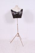 A vintage shop display tailors dummy tor