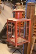 A vintage metal work lantern finished in