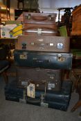 A stack of vintage 20th century suitcase