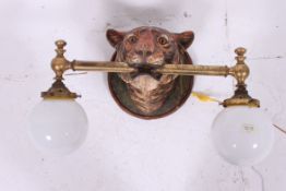 A fabulous 20th century twin tiger mask