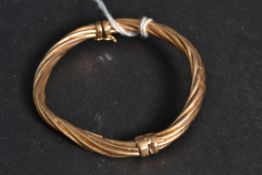 A ladies 9ct gold twist bracelet with sp