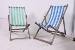 A pair of 1970's beech wood canvas uphol