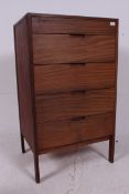 A Danish teak upright pedestal tall ches