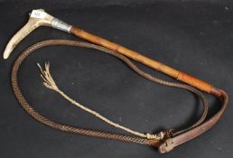 A hallmarked silver banded riding crop w