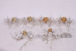 A collection of chandeliers and parts et