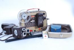 A Kodak cine projector together with tri