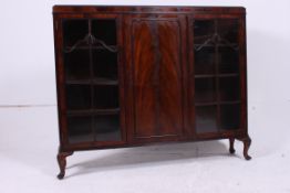 A 1930's Art Deco mahogany bookcase disp