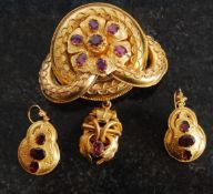 A Victorian gold plated brooch, the text