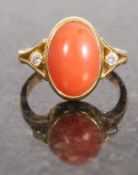 A 18k gold, red coral and diamond ladies