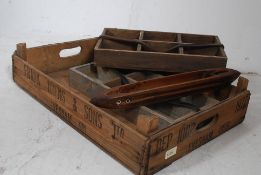A vintage wooden fruit tray together wit