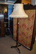 A 1930's Mahogany tripod base upright st