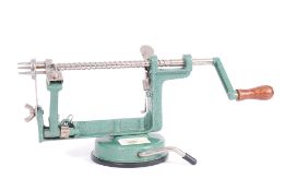 A vintage industrial kitchen apple corer