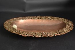A Victorian copper pressed fruit bowl wi