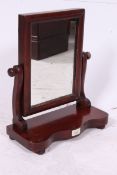 A Victorian dressing table swing mirror.