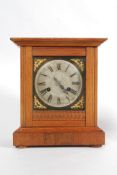 An oak cased Hamburg America mantel cloc