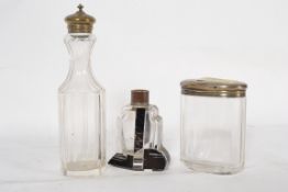 A 1930's Art Deco cut glass perfume bott