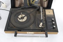 A retro portable record player having fa