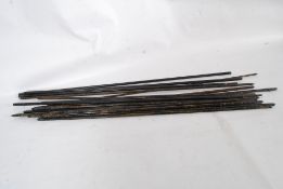 A  quantity of brass stair rods / stair