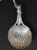 A silver Onslow pattern caddy spoon with