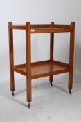 A 1920's solid oak two tier butlers serv