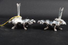 A pair of silver plated table salts