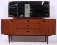 A 1930's golden oak drop leaf harvest ta