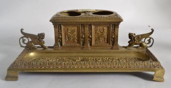 An early 20th century brass desk tidy wi