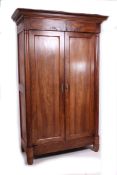 A 19th century French oak armoire double