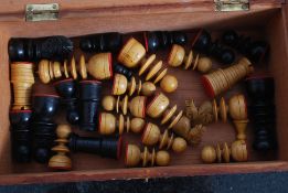 A vintage wooden chess set in a decorati