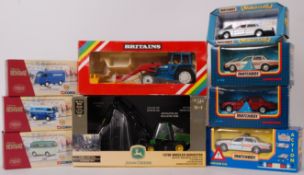 DIECAST; A mixed lot of boxed diecast mo
