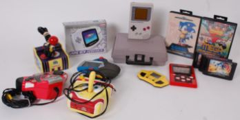 GAMING; A mixed lot of vintage retro gam