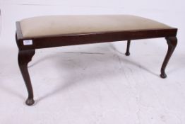 A large oak window seat box having padde