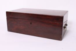A Victorian writing slope with hinged centre having appointed interior within.