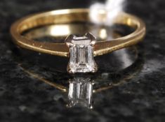An 18ct gold and diamond solitaire ring.