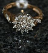 A 9ct gold and diamond ladies ring, with