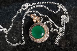 A white metal 925 silver and CZ and real