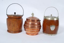 Three vintage oak biscuit barrels all wi