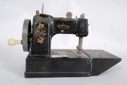 A vintage childrens Vulcan sewing machin