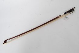 A 20th century mahogany and mother of pe