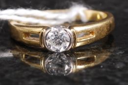 An 18ct gold and diamond inset thick ban