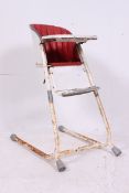 A retro 1970's Harmot childs high chair