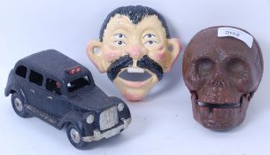 Three vintage style cast iron items to i