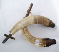 Two early 20th century horn powder flasks / drinking flasks, with sprung open ends.