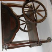 A vintage retro 1950's walnut Italian rococo tea / serving trolley raised on the original castors