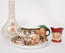 2 Royal Doulton Miniature toby jugs together with a Crown Derby Imari pattern cup and saucer along