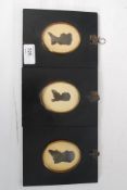A collection of 3x early 20th century silhouettes each within ebonised frames with domed glass.